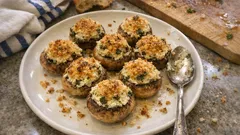 Champignons farcis au four à l’ail et fines herbes : l’apéro fondant et croustillant
