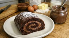 Roulé au chocolat façon goûter : biscuit moelleux et garniture pâte à tartiner