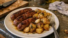 Saucisses de Toulouse au four et pommes de terre au thym : doré, simple et convivial