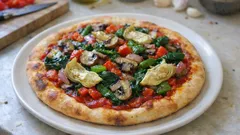 Pizza sans fromage aux légumes et olives : une pâte maison dorée, sans lactose